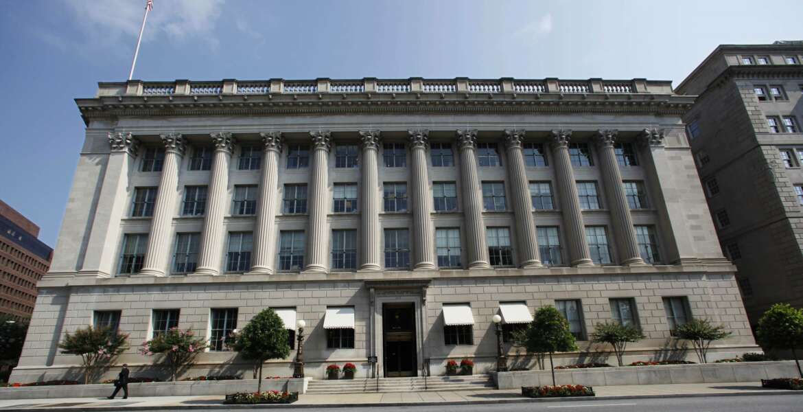 FILE - This Aug. 4, 2009, file photo shows the United States Chamber of Commerce building in Washington. The White House says a senior national security official is leading the U.S. response to a massive breach of government departments and private corporations discovered late last year. The announcement that the deputy national security adviser for cyber and emergency technology, Anne Neuberger, has been in charge of the response to the SolarWinds hack follows congressional criticism of the government effort so far as “disorganized.” (AP Photo/Manuel Balce Ceneta, File)