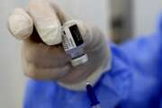 A nurse prepares a syringe of the Pfizer-BioNTech COVID-19 vaccine during a nationwide vaccination campaign, at the Saint George Hospital, in Beirut, Lebanon, Tuesday, Feb. 16, 2021. Lebanon launched its inoculation campaign after receiving the first batch of the vaccine — 28,500 doses from Brussels with more expected to arrive in the coming weeks. (AP Photo/Hussein Malla)