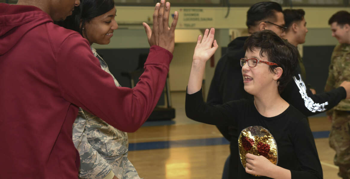 Military members get active with special needs children