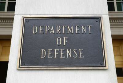 FILE - This April 19, 2019 file photo shows a sign for the Department of Defense at the Pentagon in Washington. The Biden administration’s nominee for top Pentagon policy adviser was met with sharp criticism from Republicans on the Senate Armed Services Committee Thursday, including accusations that he has been too partisan to be confirmed for the job. Colin Kahl, who served as national security adviser to then-Vice President Joe Biden during the Obama administration, faced repeated questions on his previous support for the Iran nuclear deal and how he would approach that issue now. (AP Photo/Patrick Semansky)