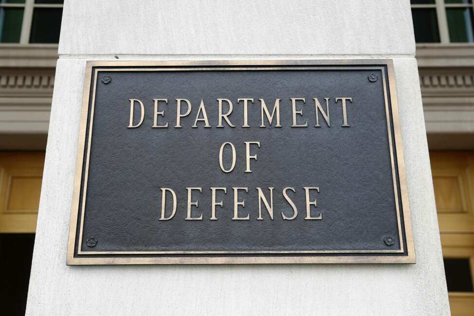 FILE - This April 19, 2019 file photo shows a sign for the Department of Defense at the Pentagon in Washington. The Biden administration’s nominee for top Pentagon policy adviser was met with sharp criticism from Republicans on the Senate Armed Services Committee Thursday, including accusations that he has been too partisan to be confirmed for the job. Colin Kahl, who served as national security adviser to then-Vice President Joe Biden during the Obama administration, faced repeated questions on his previous support for the Iran nuclear deal and how he would approach that issue now. (AP Photo/Patrick Semansky)