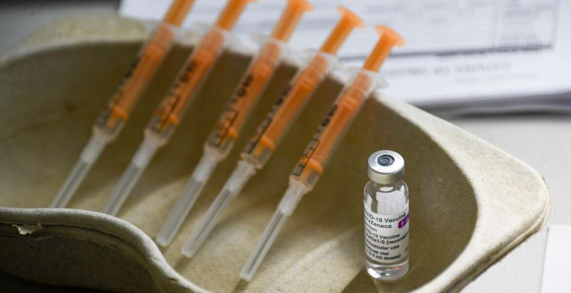 FILE - In this Sunday, March 21, 2021 file photo a vial and syringes of the AstraZeneca COVID-19 vaccine, at the Guru Nanak Gurdwara Sikh temple, on the day the first Vaisakhi Vaccine Clinic is launched, in Luton, England. AstraZeneca said Monday March 22, 2021 that advanced trial data from a U.S. study on its COVID vaccine shows it is 79% effective. The U.S. study comprised 30,000 volunteers, 20,000 of whom were given the vaccine while the rest got dummy shots. (AP Photo/Alberto Pezzali, File)