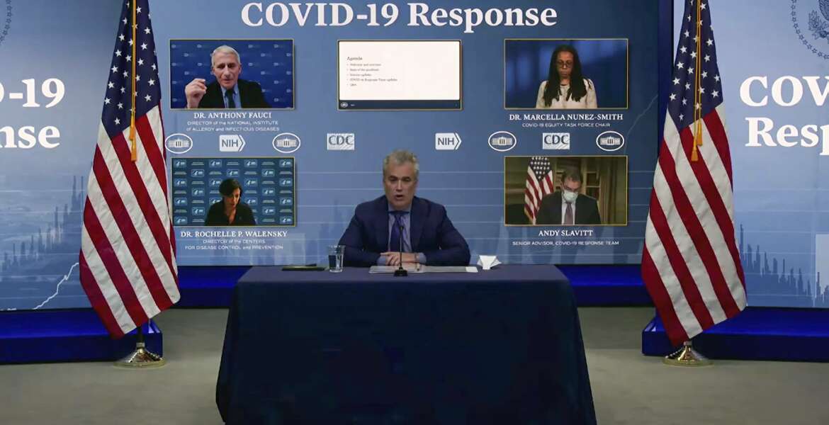 FILE - In this Jan. 27, 2021, file image from video, Jeff Zients, White House coronavirus response coordinator, speaks as Dr. Anthony Fauci, director of the National Institute of Allergy and Infectious Diseases and chief medical adviser to the president., Dr. Marcella Nunez-Smith, chair of the COVID-19 health equity task force, Dr. Rochelle Walensky, director of the Centers for Disease Control and Prevention, and Andy Slavitt, senior adviser to the White House COVID-19 Response Team,, appear on screen during a White House briefing on the Biden administration's response to the COVID-19 pandemic in Washington. (White House via AP, File)