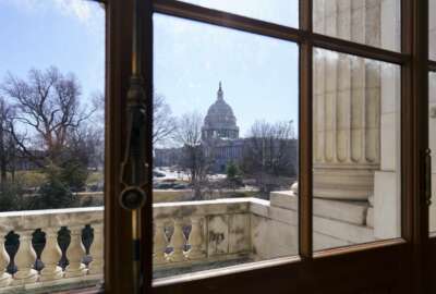 The Capitol is seen from the Russell Senate Office Building during a delay in work on the Democrats' $1.9 trillion COVID-19 relief bill, at the Capitol in Washington, Friday, March 5, 2021. (AP Photo/J. Scott Applewhite)