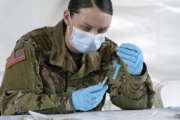 U.S. Army medic Kristen Rogers of Waxhaw, N.C. fills syringes with the Johnson &amp; Johnson COVID-19 vaccine, Wednesday, March 3, 2021, in North Miami, Fla. FEMA opened four mass vaccinations sites in Florida capable of vaccinating up to 3,000 people a day, seven days a week. (AP Photo/Marta Lavandier)