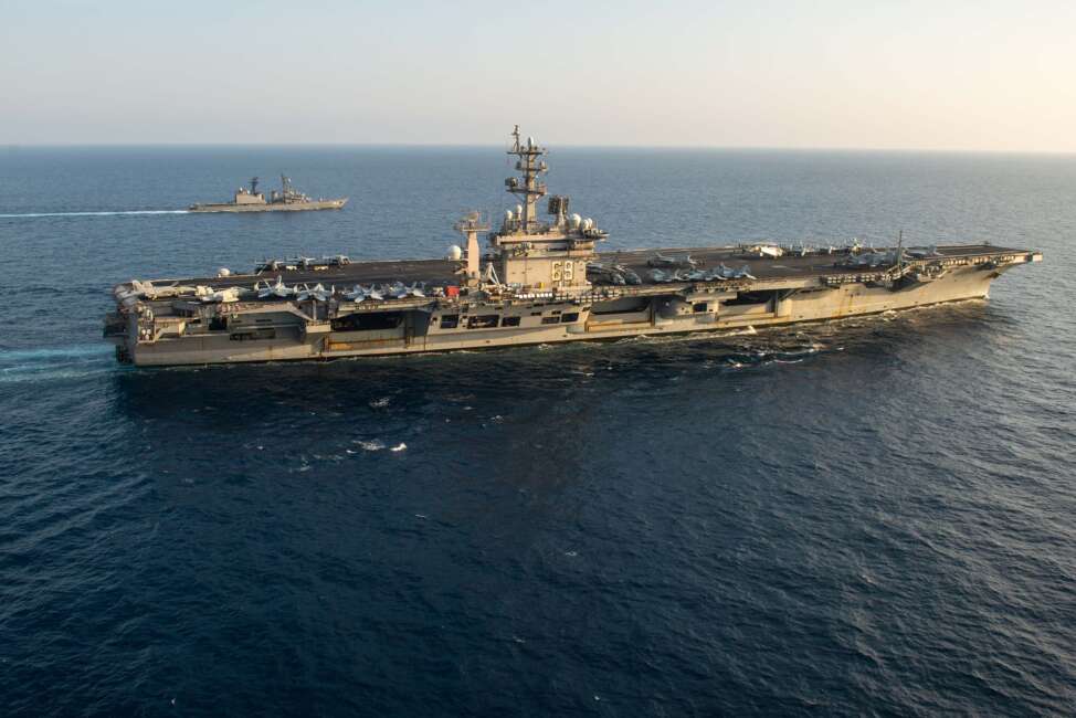 The aircraft carrier USS Dwight D. Eisenhower (CVN 69) conducts flight operations and sails with the Japanese Maritime Self Defense Force destroyer Setogiri (DD 156), in the Arabian Sea. The Eisenhower Carrier Strike Group is deployed to the U.S. Naval Forces Central Command / U.S. 5th Fleet area of operations in support of naval operations to ensure maritime stability and security in the region. (Photo by MC3 Sawyer Haskins)