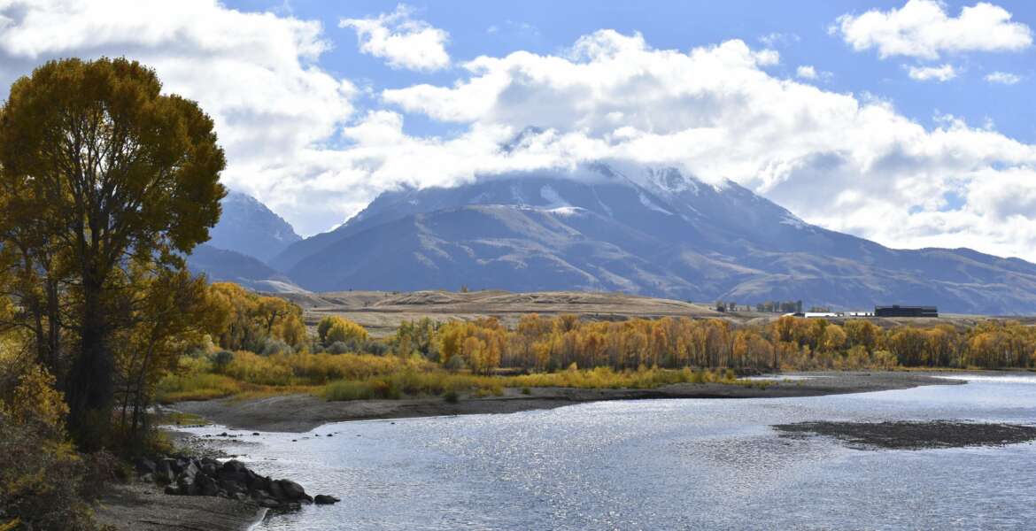 FILE - In this Oct. 8, 2018, file photo, Emigrant Peak is seen rising above the Paradise Valley and the Yellowstone River near Emigrant, Mont. The Biden administration has nominated a longtime environmental advocate and Democratic aide, Tracy Stone-Manning, to oversee roughly 250 million acres of public lands as director of the Bureau of Land Management. (AP Photo/Matthew Brown, File)