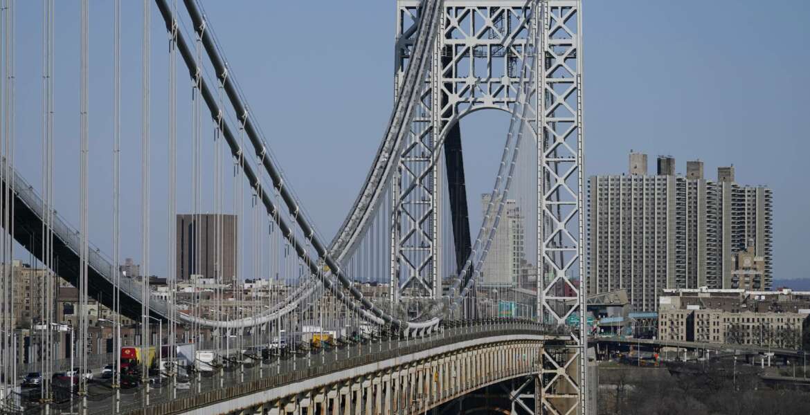 Traffic moves over the George Washington Bridge as seen from Fort Lee, N.J., Tuesday, April 6, 2021. President Joe Biden is setting about convincing America it needs his $2.3 trillion infrastructure plan, deputizing a five-member 
