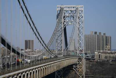 Traffic moves over the George Washington Bridge as seen from Fort Lee, N.J., Tuesday, April 6, 2021. President Joe Biden is setting about convincing America it needs his $2.3 trillion infrastructure plan, deputizing a five-member 