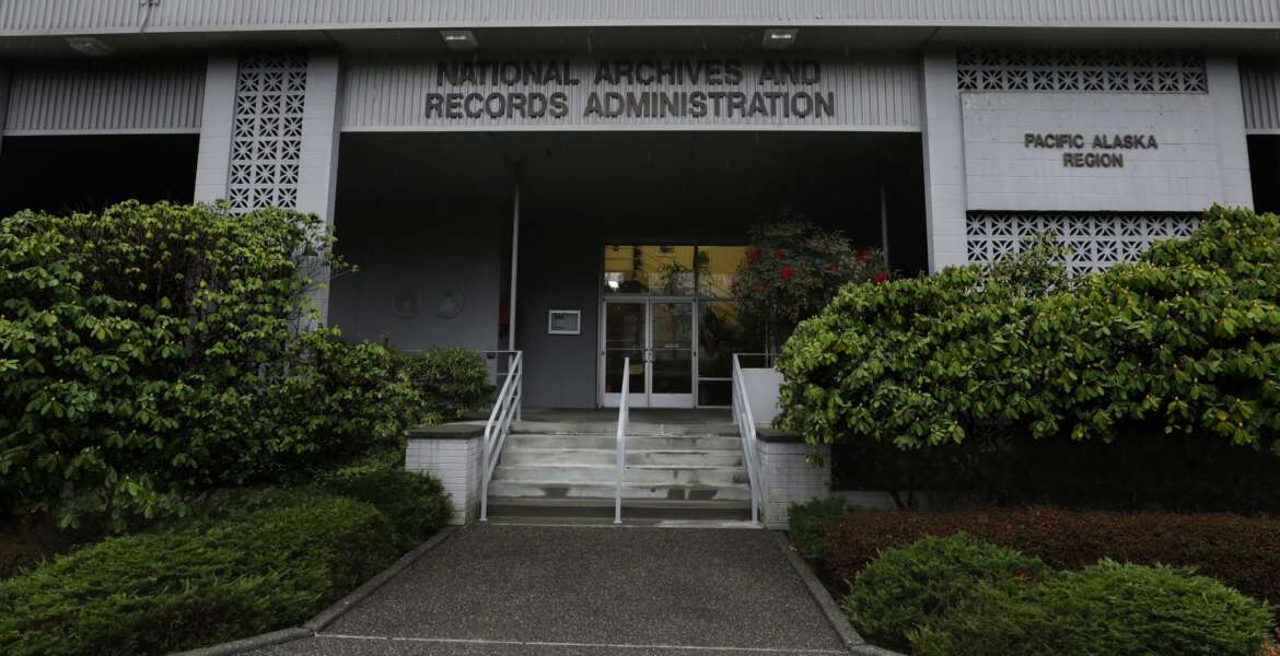 FILE - This Jan. 23, 2020, file photo shows the National Archives in the Sand Point neighborhood of Seattle that has about a million boxes of generally unique, original source documents and public records. In an announcement made Thursday, April 8, 2021, the Biden administration has halted the sale of the federal archives building in Seattle, following months of opposition from people across the Pacific Northwest and a lawsuit by the Washington Attorney General's Office. Among the records at the center are tribal, military, land, court, tax and census documents. (Alan Berner/The Seattle Times via AP, File)