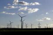 FILE-In this Oct. 4, 2016 taken photo wind turbines spin near Halle, central Germany. Germany’s top court has ruled that the government has to set clear goals for reducing greenhouse gas emissions after 2030, arguing that current legislation doesn’t go far enough in curbing climate change. (AP Photo/Matthias Schrader)