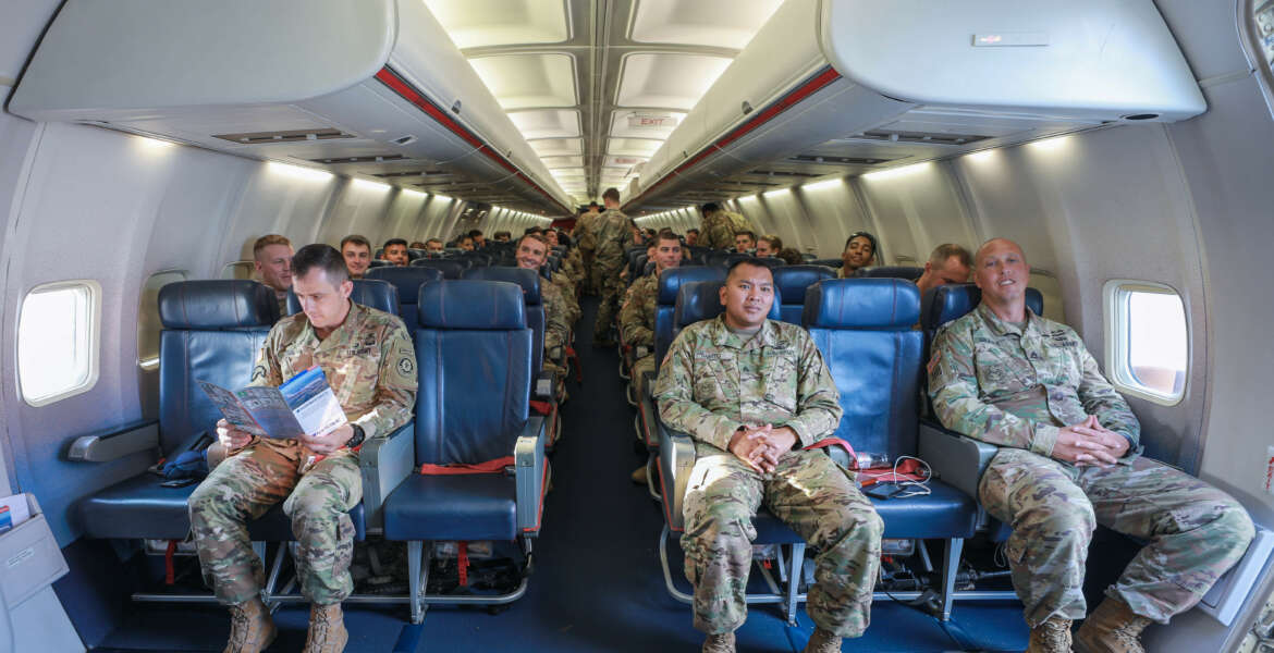 Soldiers assigned to the 3rd Squadron, 2d Cavalry Regiment prepare for departure aboard an aircraft at the Nuremberg Airport, Germany, July 26, 2018. 3/2CR is en route to Georgia to participate in Noble Partner 18 - a Georgian Armed Forces and U.S. Army Europe cooperatively-led exercise in its fourth iteration. The exercise is intended to support and enhance the readiness and interoperability of Georgia, the U.S. and participating nations during a multinational training operation. (U.S. Army photo by 1st Lt. Ellen C. Brabo)