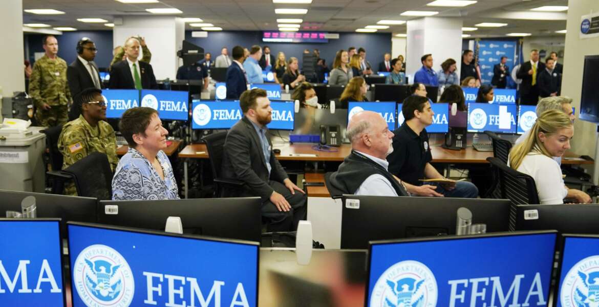 FEMA employees listen to President Joe Biden talk at FEMA headquarters, Monday, May 24, 2021, in Washington. (AP Photo/Evan Vucci)