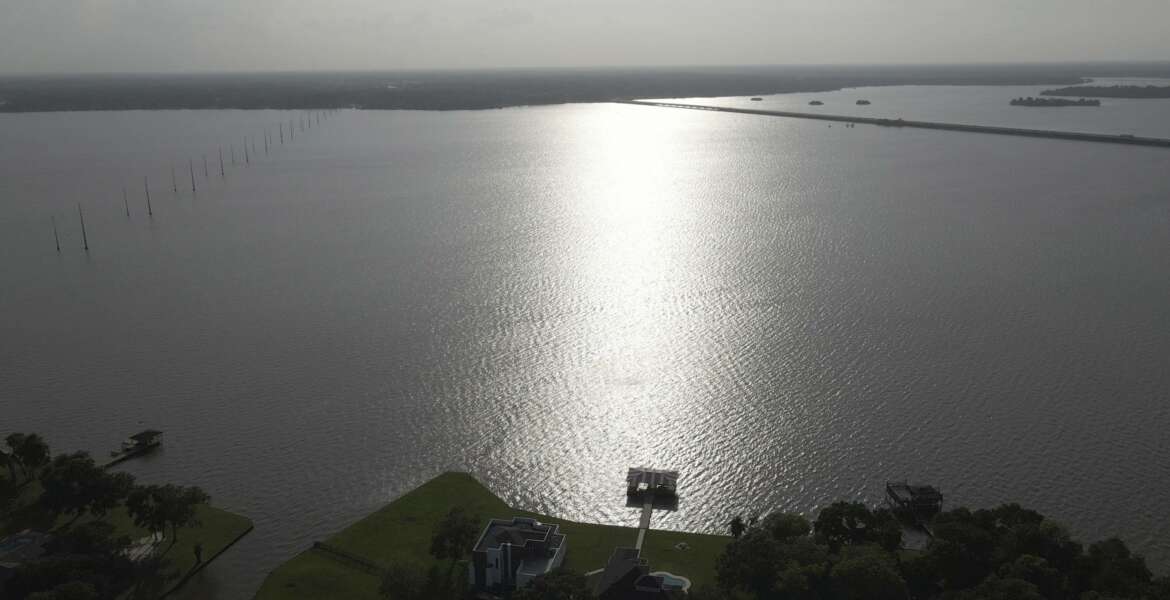 Aerial view of Lake Houston in Huffman, Texas, on May 10, 2021. The Luce Bayou which feeds into the lake often is the source of flooding problems in neighboring subdivisions when extreme weather strikes. (AP Photo/John L. Mone)