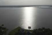 Aerial view of Lake Houston in Huffman, Texas, on May 10, 2021. The Luce Bayou which feeds into the lake often is the source of flooding problems in neighboring subdivisions when extreme weather strikes. (AP Photo/John L. Mone)