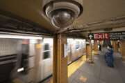 FILE - In this Oct. 7, 2020, file photo, a video surveillance camera is installed on the ceiling above a subway platform in the Court Street station in the Brooklyn borough of New York. State lawmakers across the U.S. are reconsidering the tradeoffs of facial recognition technology amid civil rights and racial bias concerns. (AP Photo/Mark Lennihan, File)