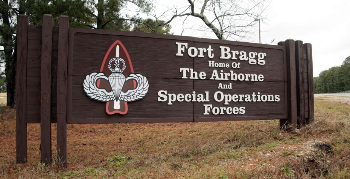 FILE - This Jan. 4, 2020 file photo shows a sign for at Fort Bragg, N.C. The push to remove Confederate names from Pentagon properties, including storied Army posts, could eventually affect hundreds of items and facilities, the chair of the congressionally chartered Naming Commission said Friday, May 21, 2021. The initial public focus was on Army bases such as Fort Bragg, North Carolina, which is named for Confederate general Braxton Bragg, and Fort Benning, Georgia, named for Brig. Gen. Henry L. Benning, who served under Lee. (AP Photo/Chris Seward, File)