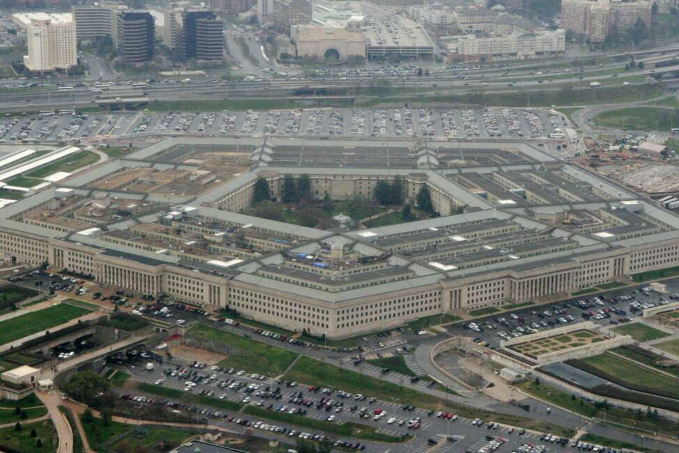 FILE - This March 27, 2008, file photo, shows the Pentagon in Washington. Reports of sexual assaults across the U.S. military increased by a very small amount in 2020, a year when troops were largely locked down for months as bases around the world grappled with the COVID-19 pandemic, according to U.S. officials. (AP Photo/Charles Dharapak, File)