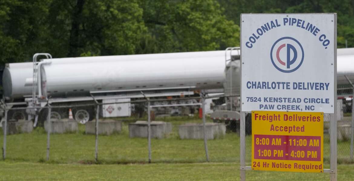 Tanker trucks are parked near the entrance of Colonial Pipeline Company Wednesday, May 12, 2021, in Charlotte, N.C.  The operator of the nation’s largest fuel pipeline has confirmed it paid $4.4 million to a gang of hackers who broke into its computer systems. That's according to a report from the Wall Street Journal. Colonial Pipeline’s CEO Joseph Blount told the Journal that he authorized the payment after the ransomware attack because the company didn’t know the extent of the damage.   (AP Photo/Chris Carlson)