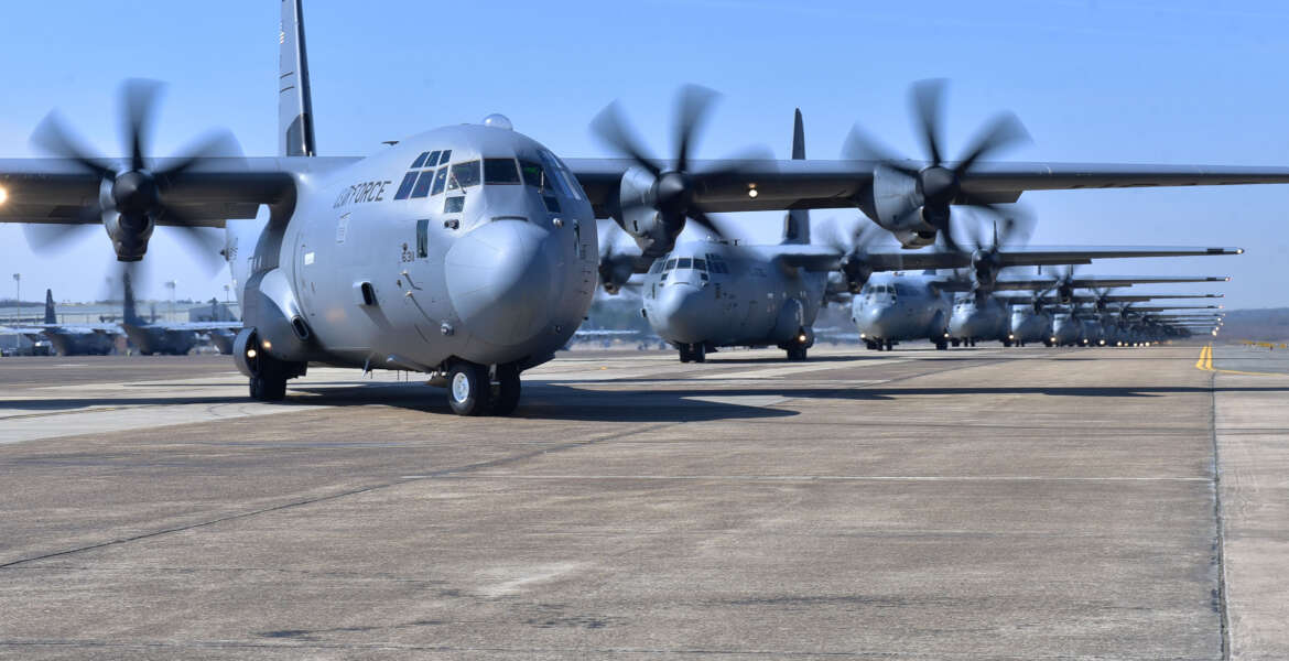 Nineteen C-130J aircraft take part in an elephant walk before takeoff during an exercise Mar. 15, 2018, at Little Rock Air Force Base, Ark. Numerous C-130J units from around the Air Force participated in a training event to enhance operational effectiveness and joint interoperability. (U.S. Air Force photo by Airman 1st Class Rhett Isbell)
