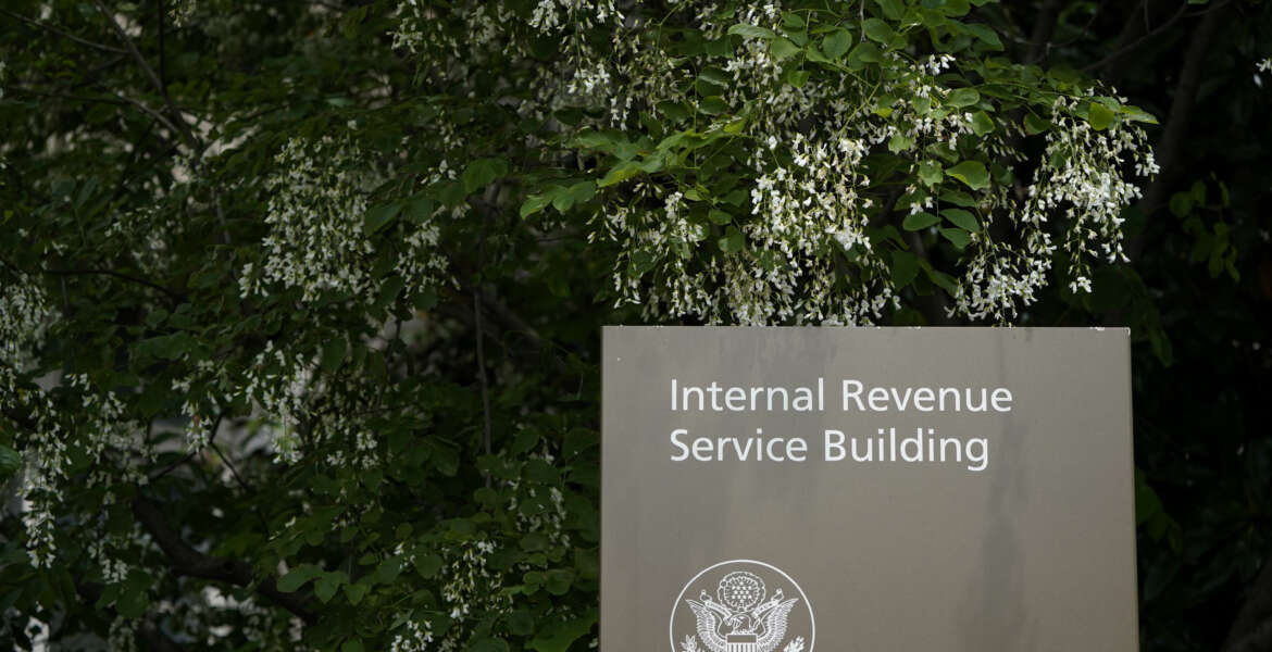 This May 4, 2021, photo shows a sign outside the Internal Revenue Service building in Washington. (AP Photo/Patrick Semansky)