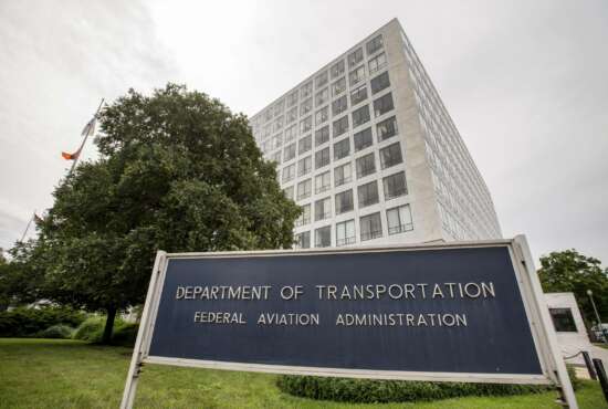 FILE - In this June 19, 2015 file photo, Department of Transportation Federal Aviation Administration building is seen in Washington.  The Federal Aviation Administration said Wednesday, June 2, 2021 that Ali Bahrami, the head of FAA's aviation safety office, will step down at the end of June. Bahrami was among FAA officials who were criticized by lawmakers and relatives of passengers on Boeing Max jets that crashed.  (AP Photo/Andrew Harnik, File)