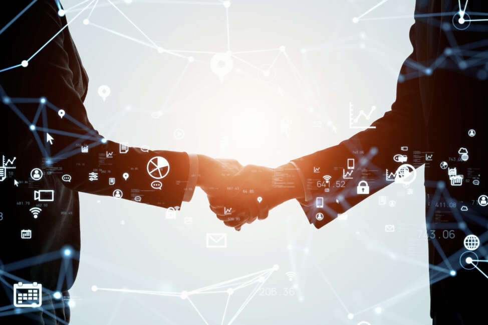 Connection of business concept. Business and technology. Shaking hands.