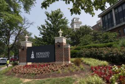FILE - In this July 6, 2021, file photo, an electronic signboard welcomes people to the Howard University campus in Washington. With the surprise twin hiring of two of the country's most prominent writers on race, Howard University is positioning itself as one of the primary centers of Black academic thought just as America struggles through a painful crossroads over historic racial injustice. (AP Photo/Jacquelyn Martin, File)