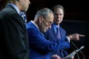 From left, Sen. Cory Booker, D-N.J.,Senate Majority Leader Chuck Schumer, D-N.Y., and Sen. Ron Wyden, D-O.R., announce a draft bill that would decriminalize marijuana on a federal level, Wednesday, July 14, 2021, on Capitol Hill in Washington. (AP Photo/Amanda Andrade-Rhoades)