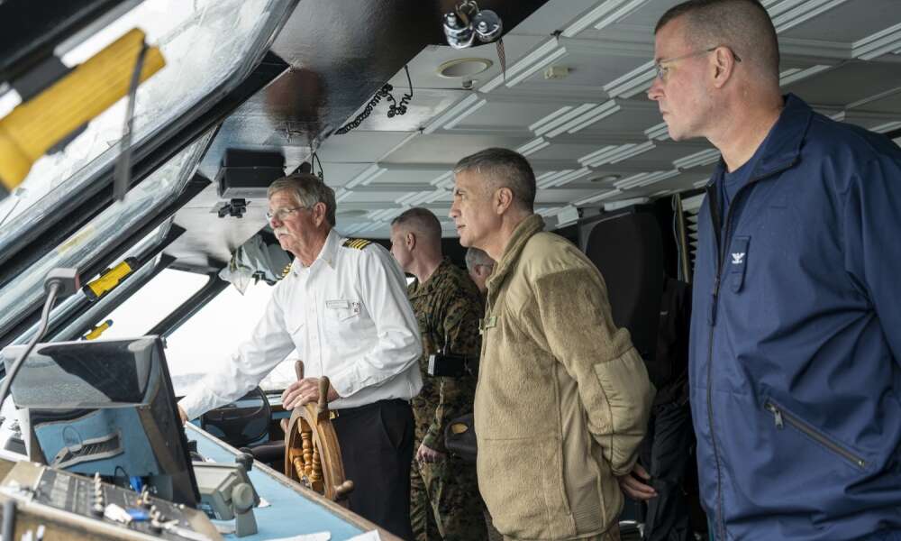 U.S. Army Gen. Paul Nakasone (middle) and Coast Guard Capt. Kevin Carroll (right) get a tour of the bridge aboard the Spirit of Norfolk while transiting to Coast Guard Base Portsmouth, Virginia, March 6, 2020. The two servicemembers were participating in the Cyber Component Commanders’ Conference, which served to raise awareness of the importance of maintaining strong cyber security postures within the Coast Guard. (U.S. Coast Guard photo by Seaman Katlin Kilroy)

