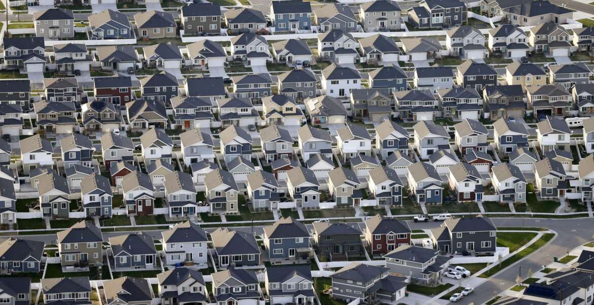 FILE - Rows of homes, are shown in suburban Salt Lake City, on April 13, 2019. The U.S. Census Bureau's release Thursday, Aug. 12, 2021, of detailed population and demographic changes in each state will kick off the once-a-decade redistricting process that plays a large role in determining which party controls state legislatures and the U.S. House. (AP Photo/Rick Bowmer, File)