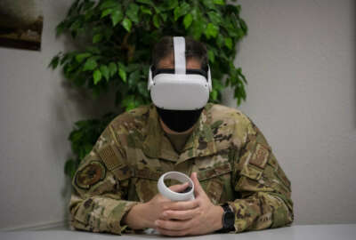 Lt. Col. Glenn Cameron, 60th Civil Engineer Squadron commander, participates in a test-virtual reality program meant to replace the suicidal awareness computer-based training Feb. 18, 2021, at Travis Air Force Base, California. The suicidal prevention training is being tested at Scott and Travis AFBs and is the only training across the Department of Defense of its kind. (U.S. Air Force photo by Nicholas Pilch)