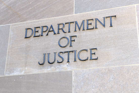 Department of Justice sign, Washington DC, USA. Many law enforcement agencies are administered by the DOJ, including the FBI, DEA and Federal Bureau of Prisons