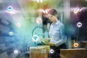 industry and Internet of Things concept. woman working in factory and wireless communication network. Industry4.0.