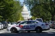 A Metropolitan Police Department cruiser blocks a street near the U.S. Capitol and a Library of Congress building in Washington on Thursday, Aug. 19, 2021, as law enforcement officials investigate a report of a pickup truck containing an explosive device. (AP Photo/Patrick Semansky)