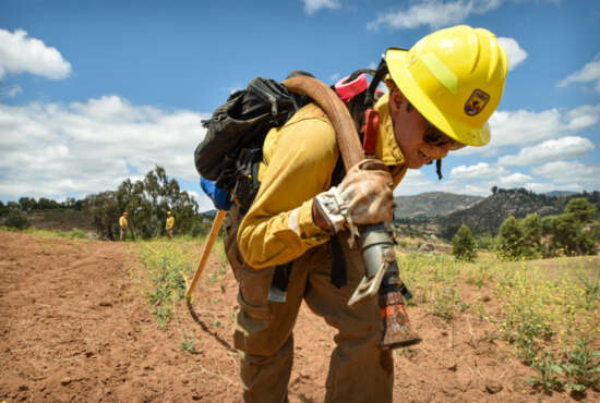 Practice makes perfect: firefighter Nick Vallardo trains with an engine crew as they prepare for the coming wildfire season. (Lisa Cox, U.S. Fish & Wildlife Service)

