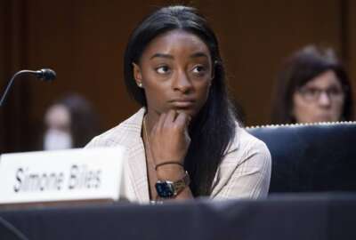 United States Olympic gymnast Simone Biles testifies during a Senate Judiciary hearing about the Inspector General's report on the FBI's handling of the Larry Nassar investigation on Capitol Hill, Wednesday, Sept. 15, 2021, in Washington. Nassar was charged in 2016 with federal child pornography offenses and sexual abuse charges in Michigan. He is now serving decades in prison after hundreds of girls and women said he sexually abused them under the guise of medical treatment when he worked for Michigan State and Indiana-based USA Gymnastics, which trains Olympians. (Saul Loeb/Pool via AP)