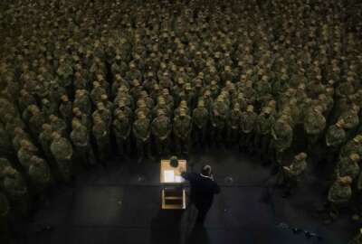 211026-N-DK722-1237 YOKOSUKA, Japan (Oct. 26, 2021) – Secretary of the Navy Carlos Del Toro speaks to the crew during an all hands call in the hangar bay of the U.S. Navy’s only forward-deployed aircraft carrier USS Ronald Reagan (CVN 76). Ronald Reagan, the flagship of Carrier Strike Group 5, provides a combat-ready force that protects and defends the United States, and supports alliances, partnerships and collective maritime interests in the Indo-Pacific region. (U.S. Navy Photo by Mass Communication Specialist 2nd Class Cameron C. Edy)