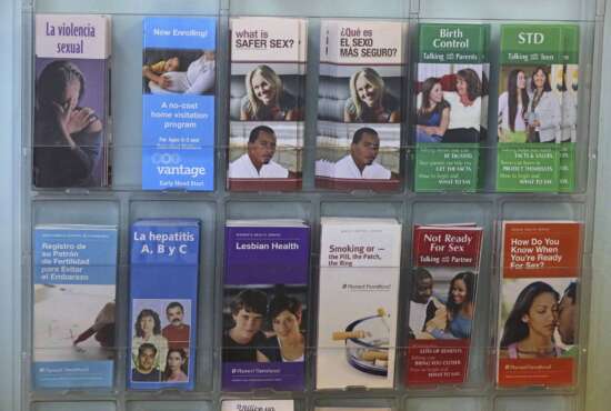 FILE - In this Aug. 21, 2019, file photo, pamphlets are shown in the clinic of Planned Parenthood of Utah in Salt Lake City. The Biden administration on Oct. 4, 2021, reversed a ban on abortion referrals by family planning clinics, lifting a Trump-era restriction as political and legal battles over abortion grow sharper from Texas to the U.S. Supreme Court. Groups representing the clinics say they hope the rule reversal leads to the return of hundreds of service providers that left the program to protest the Trump administration's policy. HHS has estimated that the upheaval led to as many as 180,000 unintended pregnancies. The clinics provide birth control and basic health care mainly to low-income women.(AP Photo/Rick Bowmer)