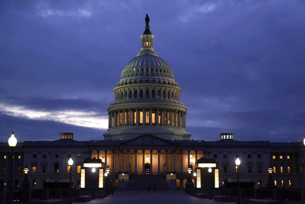 In this Oct. 6, 2021, photo, the light in the cupola of the Capitol Dome is illuminated, indicating that work continues in Congress, in Washington. The dangerous standoff in Congress over raising the debt limit as well as its ultimate resolution both were engineered by Sen. Mitch McConnell, the Republican leader determined to stop President Joe Biden’s agenda even if it pushes the country toward grave economic uncertainty. McConnell is no longer the majority leader of the Senate, but he is exerting the power of the minority in new and uncharted ways.  (AP Photo/J. Scott Applewhite)