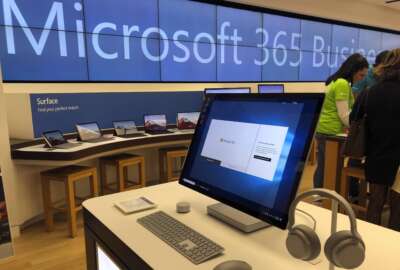 FILE - In this Jan. 28, 2020, file photo, a Microsoft computer is among items displayed at a Microsoft store in suburban Boston. Microsoft says the same Russia-backed hackers responsible for the 2020 SolarWinds breach continue to attack the global technology supply chain and are have been relentlessly targeting cloud service resellers and others since summer. (AP Photo/Steven Senne, File)