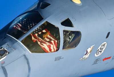 In this photo released by the U.S. Air Force, the crew of a U.S. Air Force B-1B Lancer display their mascot from the cockpit window over the Middle East Saturday, Oct. 30, 2021. The U.S. Air Force said Sunday it flew a B-1B strategic bomber over key maritime chokepoints in the Mideast with allies including Israel amid ongoing tensions with Iran as its nuclear deal with world powers remains in tatters. (U.S. Air Force/Senior Airman Jerreht Harris via AP)