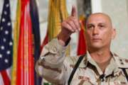 FILE - In this Aug. 7, 2003 file photo, Major General Raymond Odierno, commander of the U.S. Army Fourth Infantry Division gestures during a news conference in Tikrit, about 180 kms. (112 miles) northwest of Baghdad, Iraq.  Odierno, a retired Army general who commanded American and coalition forces in Iraq at the height of the war and capped a 39-year career by serving as the Army's chief of staff, has died, his family said Saturday, Oct. 9, 2021. He was 67.  (AP Photo/Dario Lopez-Mills, File)