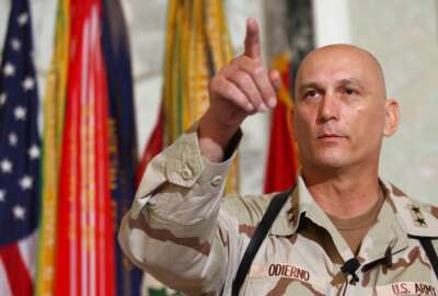 FILE - In this Aug. 7, 2003 file photo, Major General Raymond Odierno, commander of the U.S. Army Fourth Infantry Division gestures during a news conference in Tikrit, about 180 kms. (112 miles) northwest of Baghdad, Iraq.  Odierno, a retired Army general who commanded American and coalition forces in Iraq at the height of the war and capped a 39-year career by serving as the Army's chief of staff, has died, his family said Saturday, Oct. 9, 2021. He was 67.  (AP Photo/Dario Lopez-Mills, File)