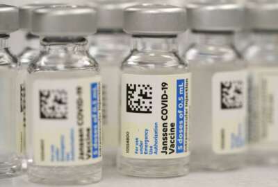 FILE - This Saturday, March 6, 2021, file photo shows vials of Johnson & Johnson COVID-19 vaccine at a pharmacy in Denver. Johnson & Johnson has asked U.S. regulators to allow booster shots of its COVID-19 vaccine as the U.S. government moves toward shoring up protection in more vaccinated Americans. J&J said Tuesday, Oct. 5, 2021, it filed data with the Food and Drug Administration on giving a booster dose between two to six months after vaccination. (AP Photo/David Zalubowski, File)