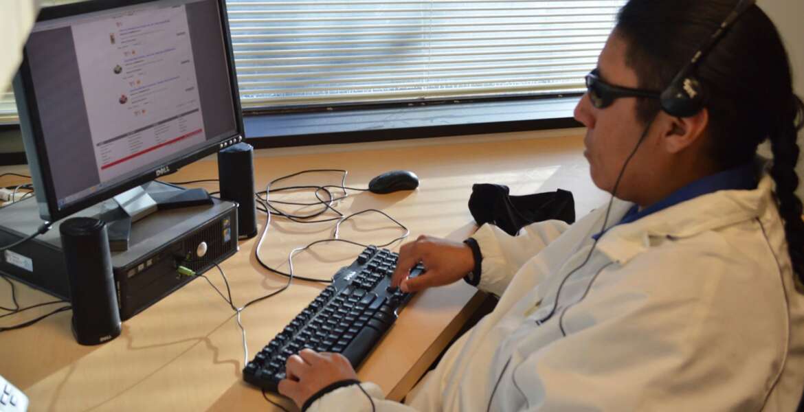 Worker with disabilities using accessibility tools