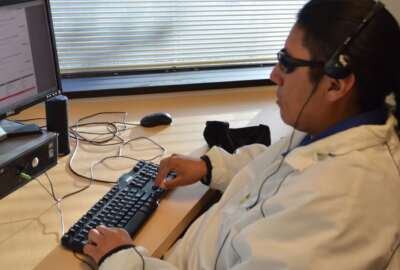 Worker with disabilities using accessibility tools
