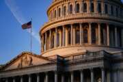 Light from the morning sun illuminates the Capitol in Washington, Friday, Dec. 3, 2021. With Democrats holding a thin majority in Congress, passage of President Joe Biden's sweeping legislative agenda will be a challenge as negotiations continue in the 50-50 Senate. (AP Photo/J. Scott Applewhite)