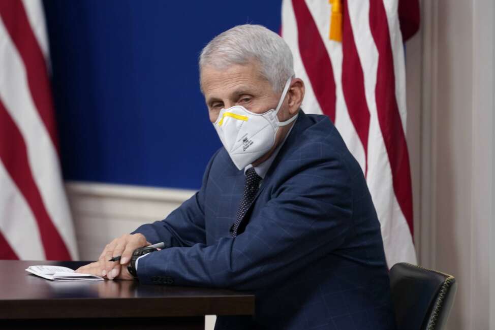 Dr. Anthony Fauci, White House Chief Medical Advisor and Director of the NIAID, participates in the White House COVID-19 Response Team's regular call with the National Governors Association in the South Court Auditorium in the Eisenhower Executive Office Building on the White House Campus, Monday, Dec. 27, 2021, in Washington. (AP Photo/Carolyn Kaster)