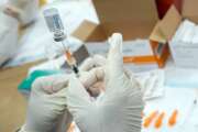 FILE - A registered nurse fills a syringe with the Johnson &amp; Johnson COVID-19 vaccine at a pop-up vaccination site in the Staten Island borough of New York, April 8, 2021. All private employers in New York City will have to require their workers to get vaccinated against COVID-19, Mayor Bill de Blasio announced Monday, Dec. 6, imposing one of the most aggressive vaccine rules in the nation. (AP Photo/Mary Altaffer, File)